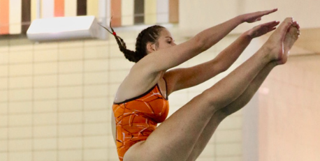 Lizzy Noel dives into the pool