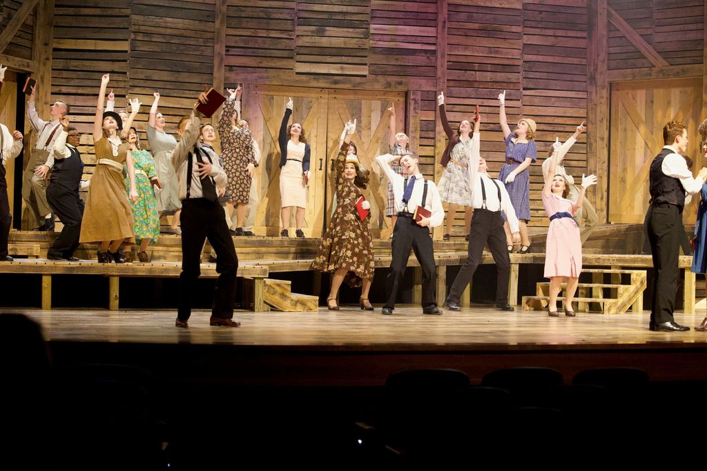 Photo of Spuds on stage during a performance of Bonnie and Clyde the musical
