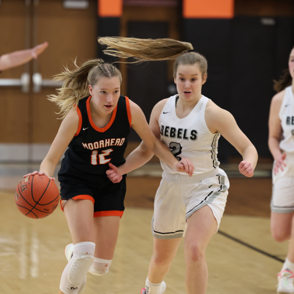 Anna Nelson dribbling the ball during a Spud basketball game on Jan. 7