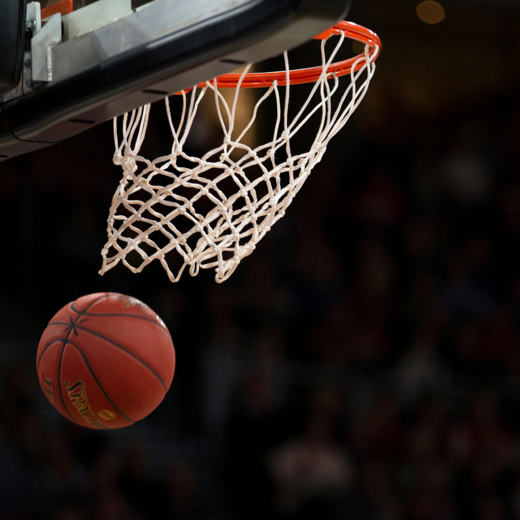 Basketball going through hoop