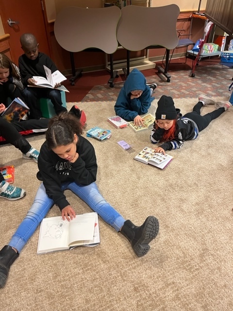 Students enjoying books