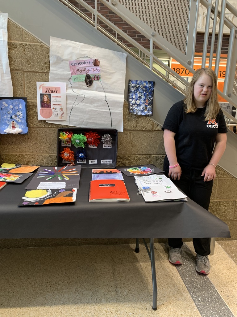 Student showcases art during art exhibit event