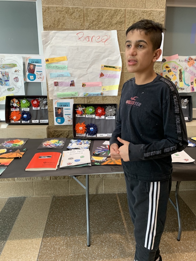 Student showcases art during art exhibit event