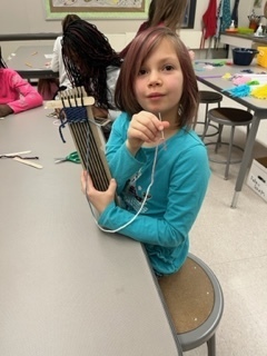 Student weaving