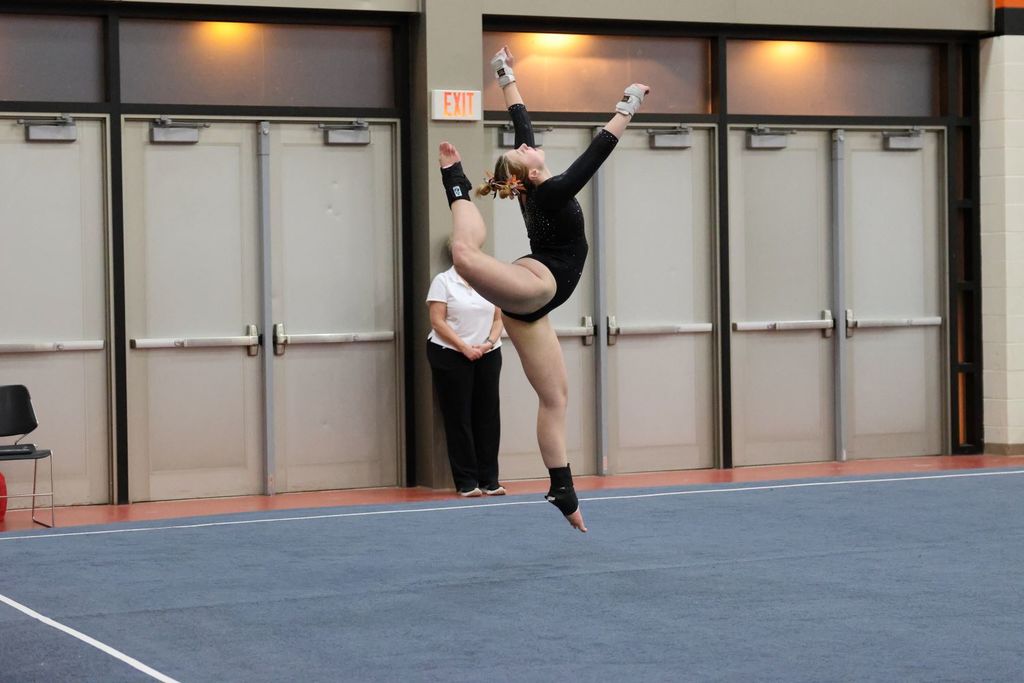 Student performs gymnastics floor routine