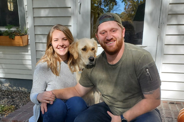 Jorde pictured with his wife Lauren and their dog Jules. 
